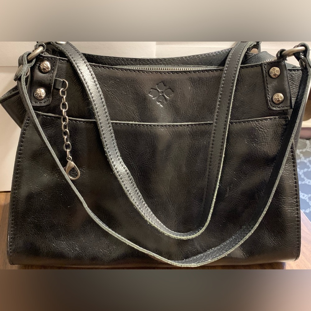 Patricia Nash black leather purse with suede lining